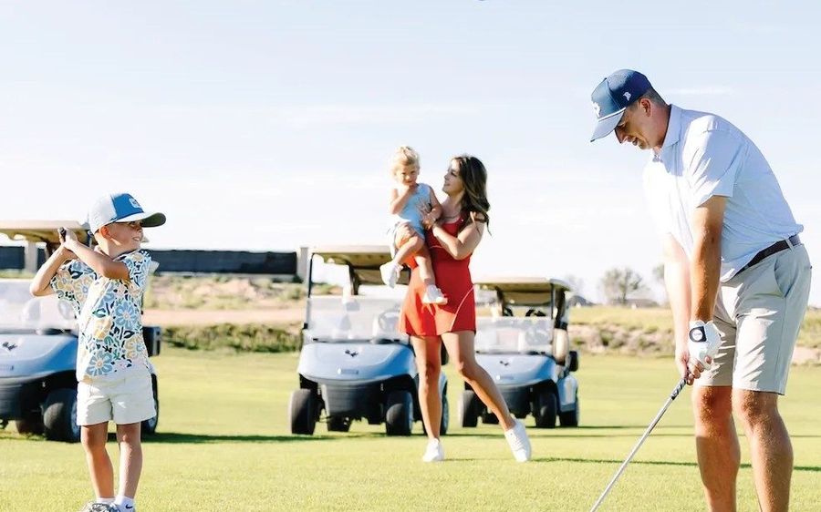 A family on the course at Red Feather.